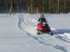 Schneescooter in voller Fahrt